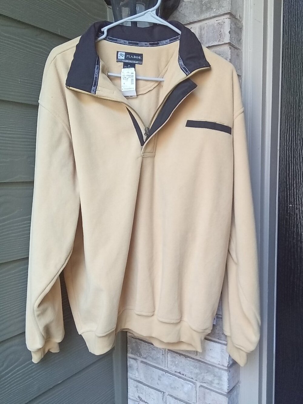 The Jos A Bank Leadbetter Golf Sweatshirt beige quarter zip fleece pullover